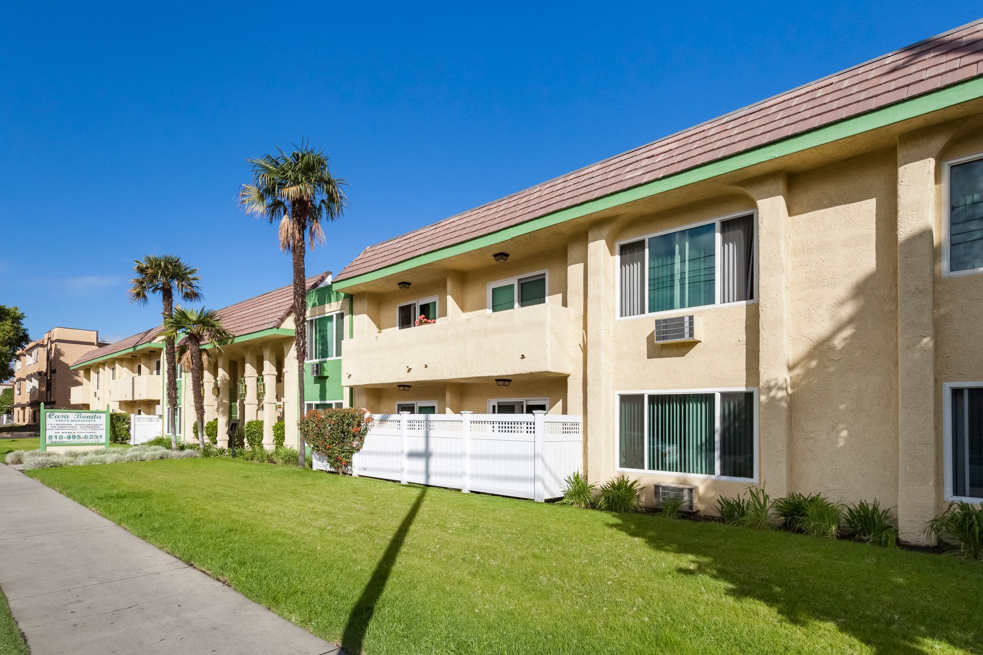 A large apartment building with a lot of windows
