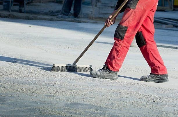 Sweeping the Ground With a Broom — Bear, DE — Smith Paving & Contracting, Inc.