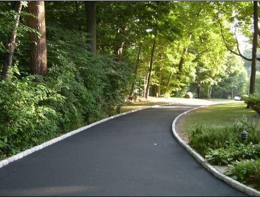 Curvy Road Going Through a Forest — Bear, DE — Smith Paving & Contracting, Inc.