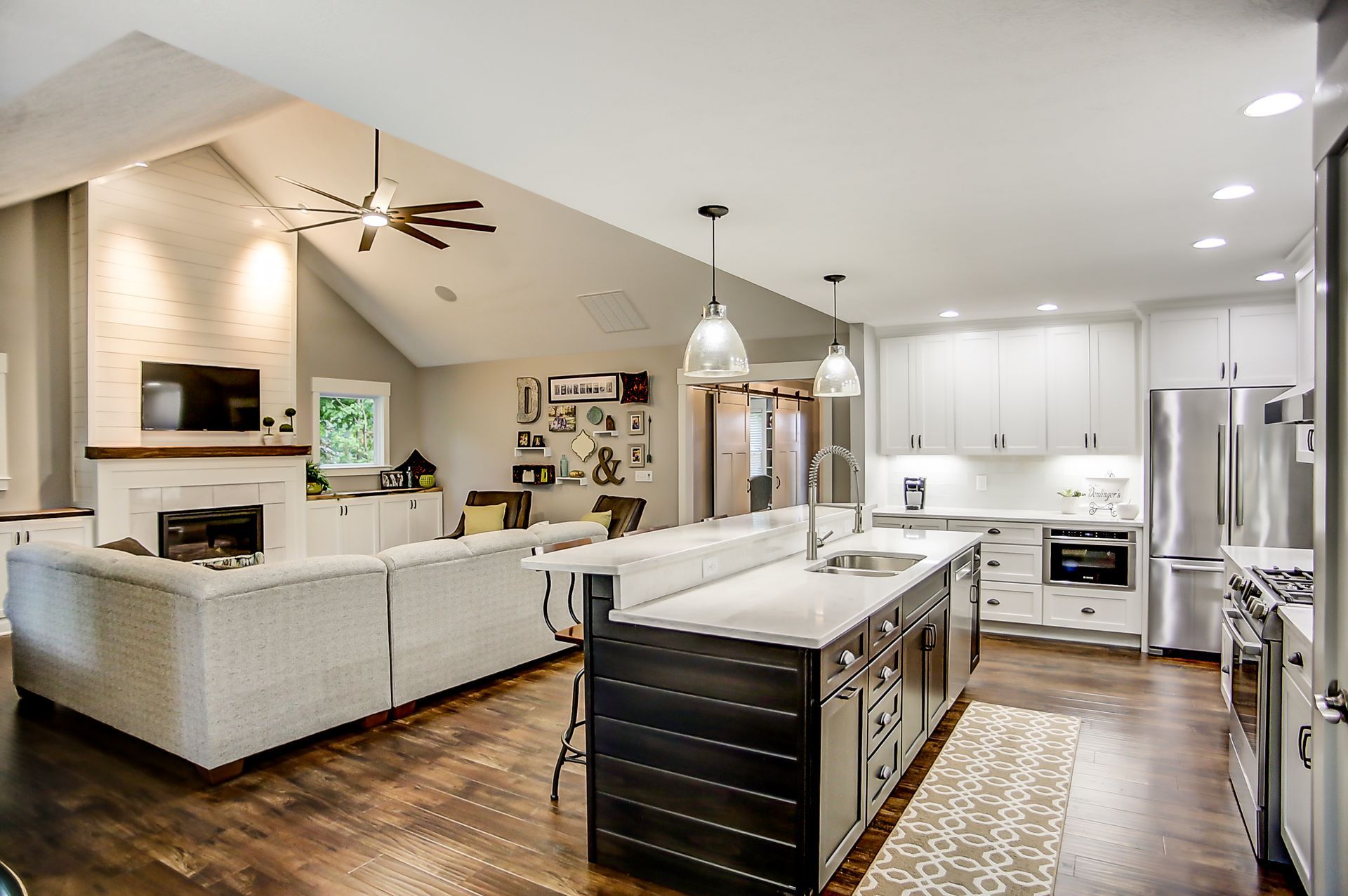 There is a large island in the middle of the kitchen.