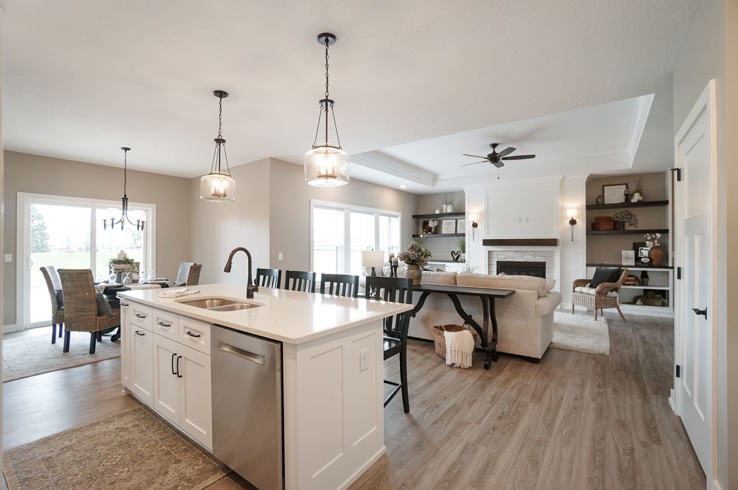 A kitchen with a large island in the middle of the room.