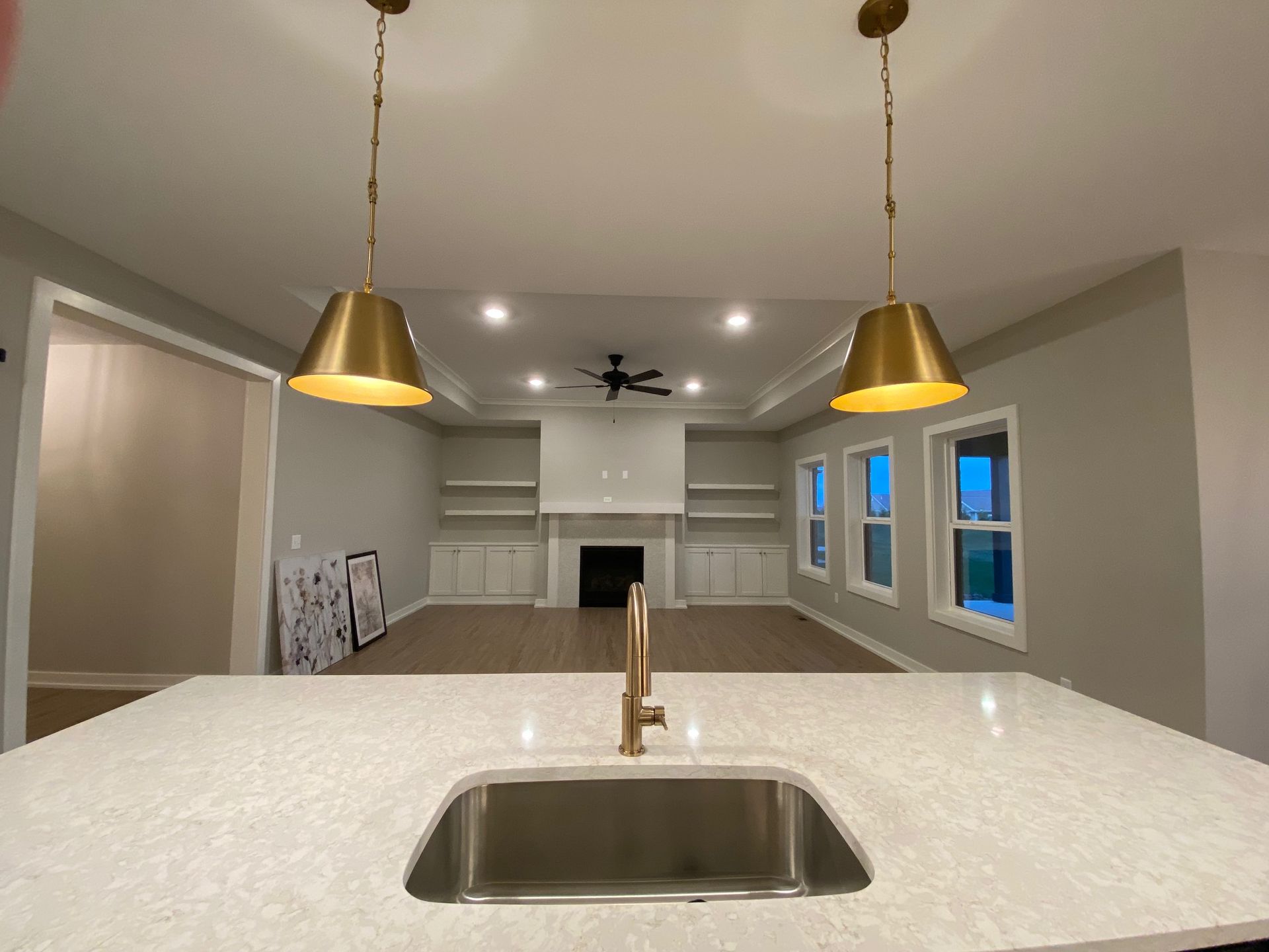 There is a sink in the middle of the kitchen.