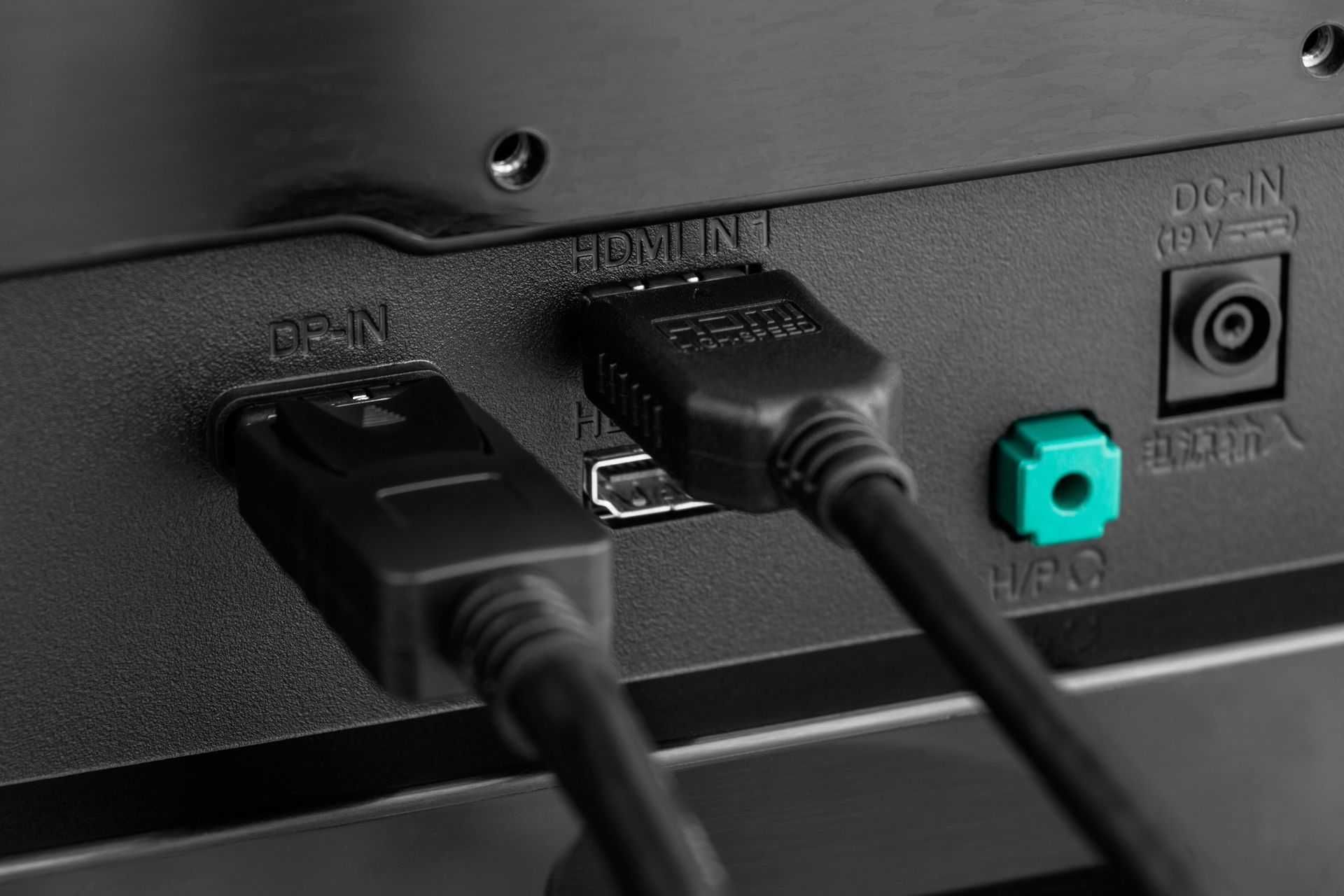 Close-up of monitor back panel with HDMI, DisplayPort, audio jack, and power connections for Audio Visual System Installation Washington IN Close-up of monitor back panel with HDMI, DisplayPort, audio jack, and power connections for Audio Visual System Installation Washington IN
