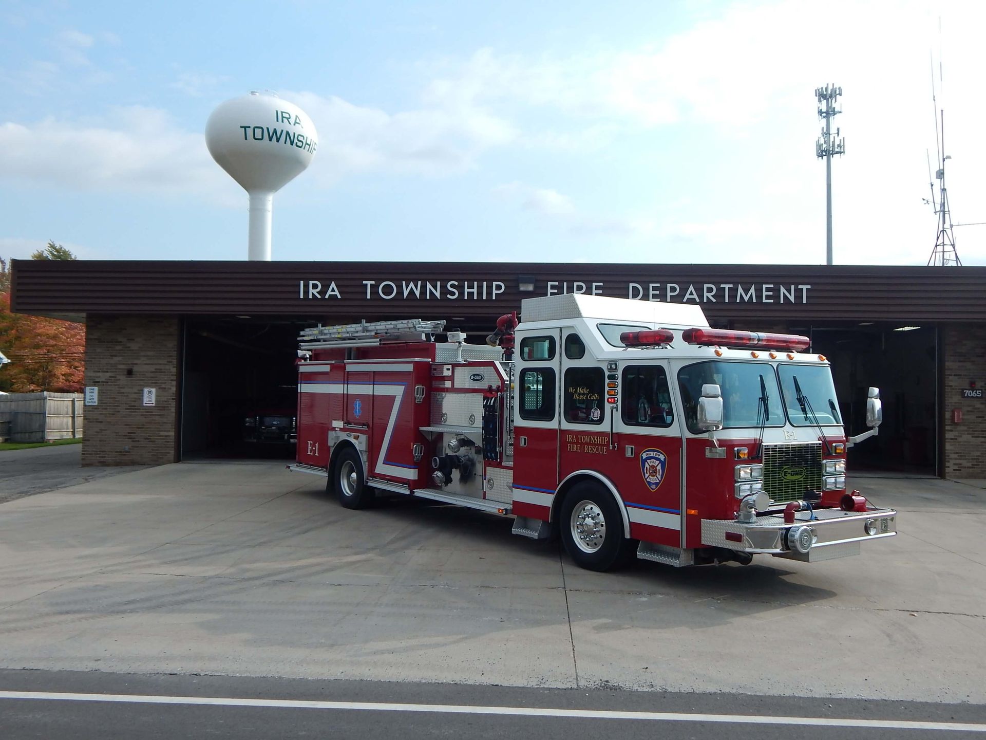 A fire truck is parked in front of the Ira Township Fire Department.