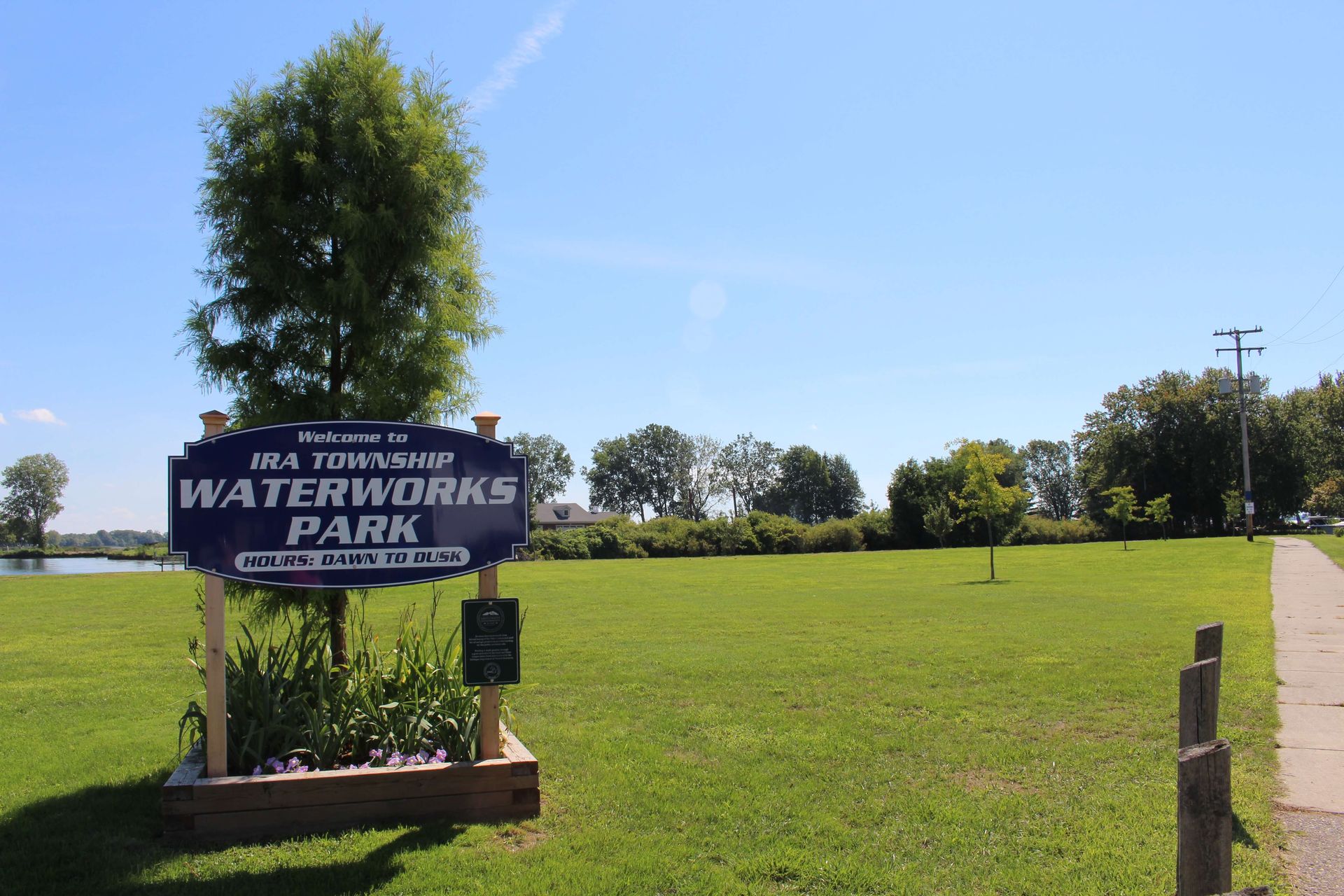 A sign that says Ira Township Waterworks Park on it.