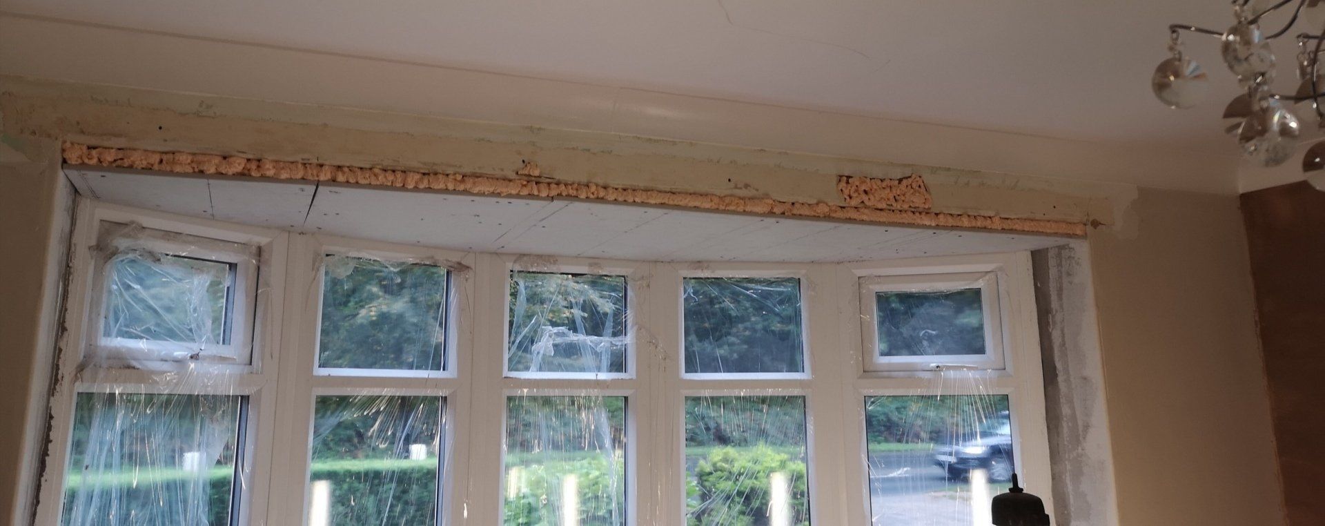 First stage of boarding an un level bay window ceiling