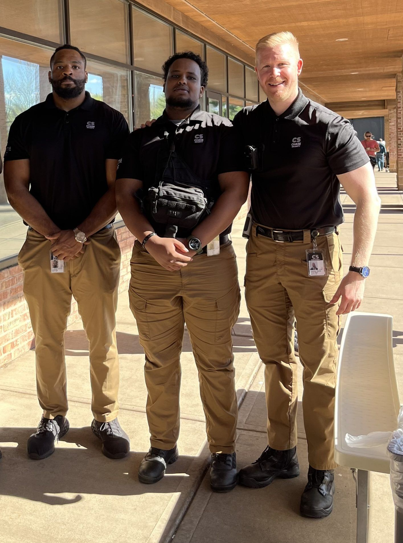 Security guard in black uniform with 