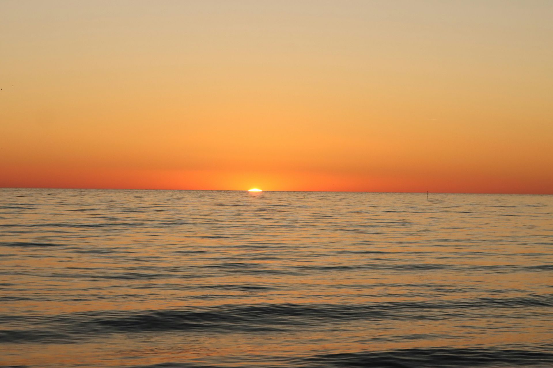 Sunrise on sea to symbolize a new month being ushered in