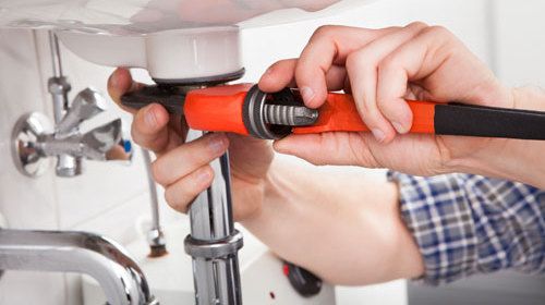 Professional providing plumbing service for kitchen basins in New Plymouth, NZ