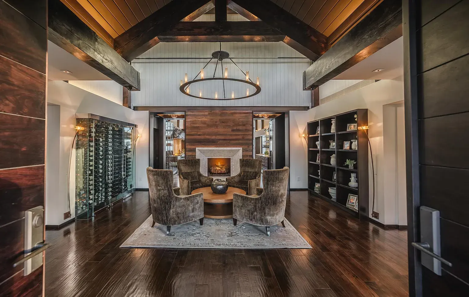 There is a fireplace in the middle of the living room.