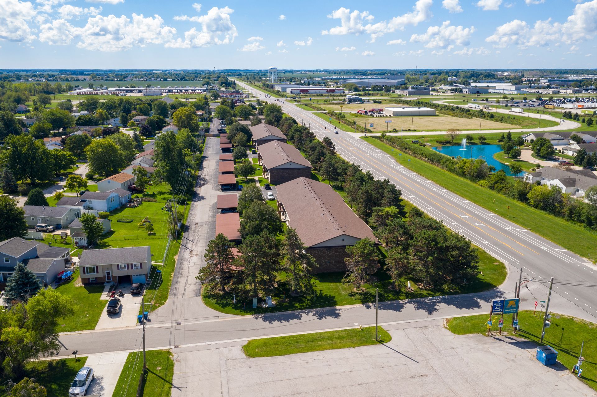 Photo of an apartment community showing a row of buildings from a bird's eye view
