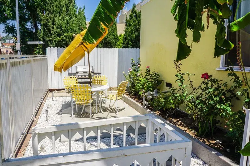 1620 N Normandie Ave Table with Umbrella