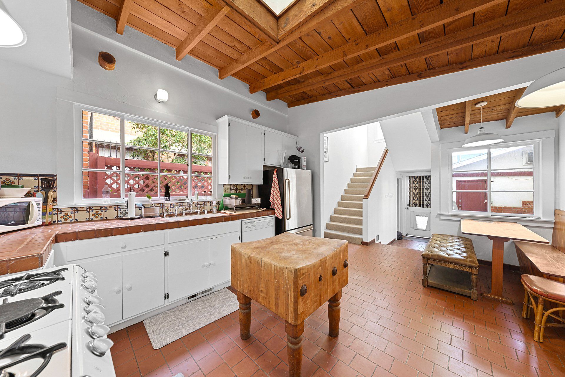 21 Eastwind St Kitchen with White Cabinets