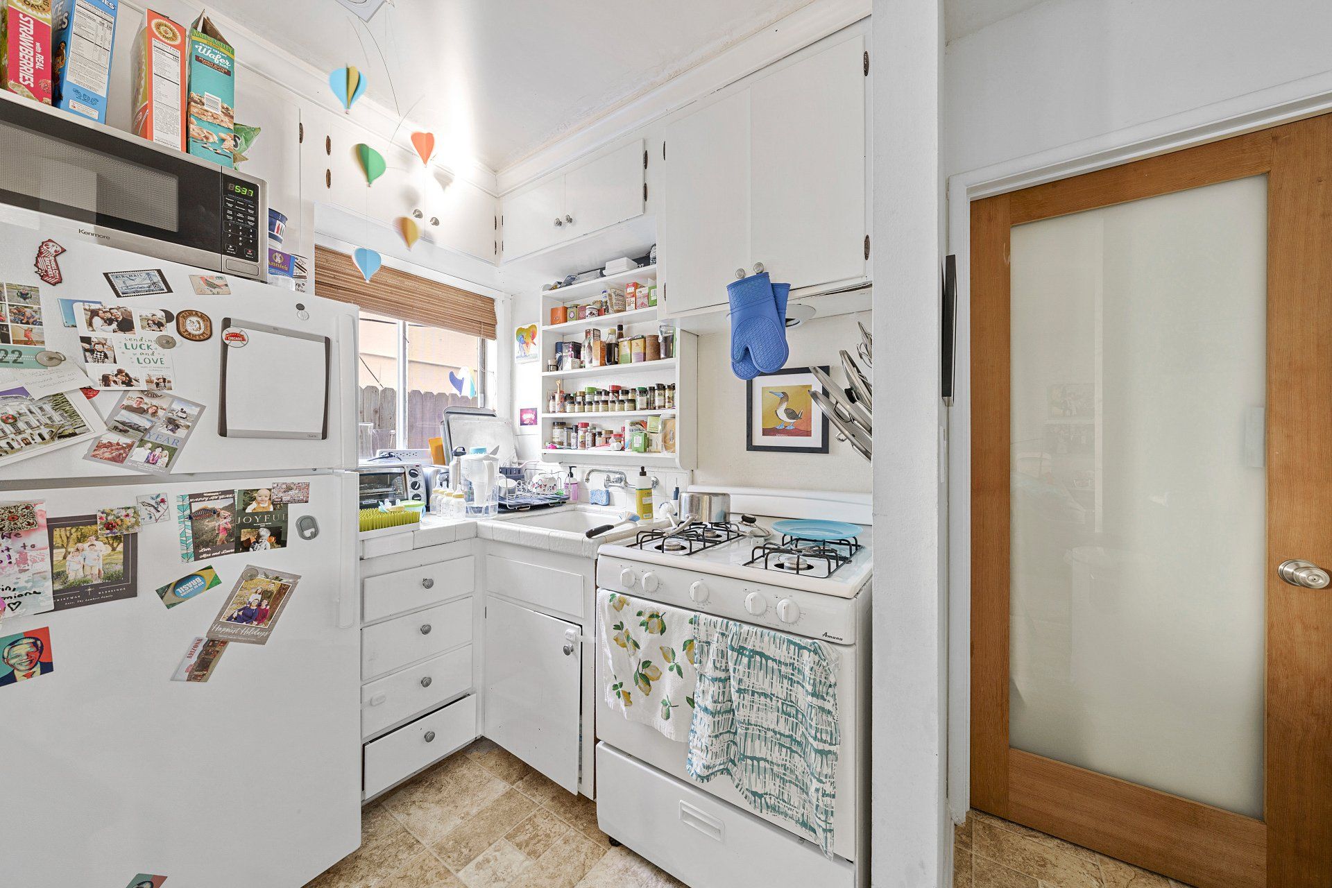 25 Eastwind St Kitchen with White Appliances