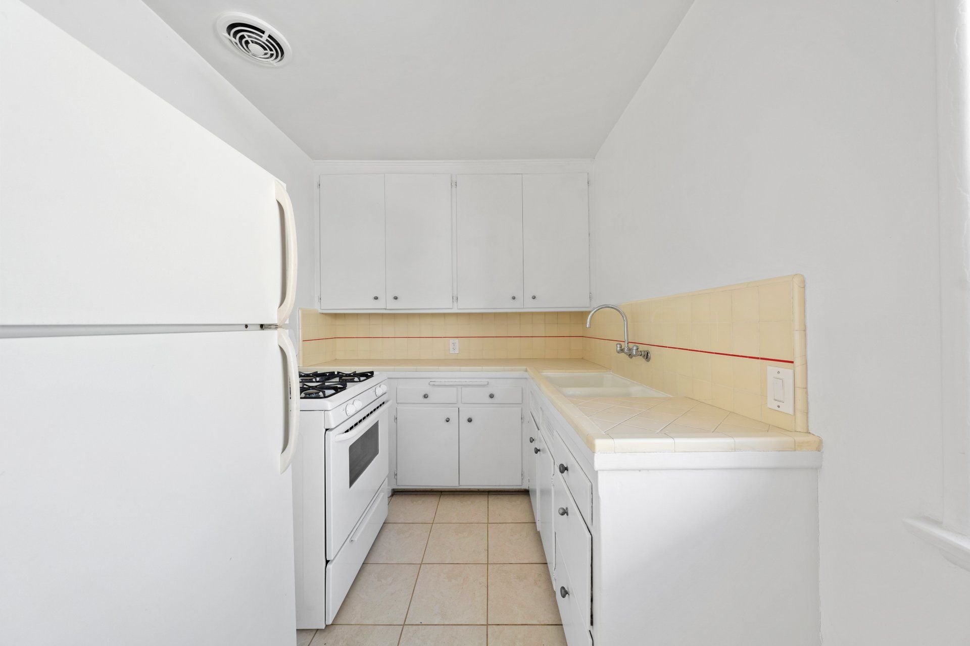 410 California Ave Kitchen with White Cabinets