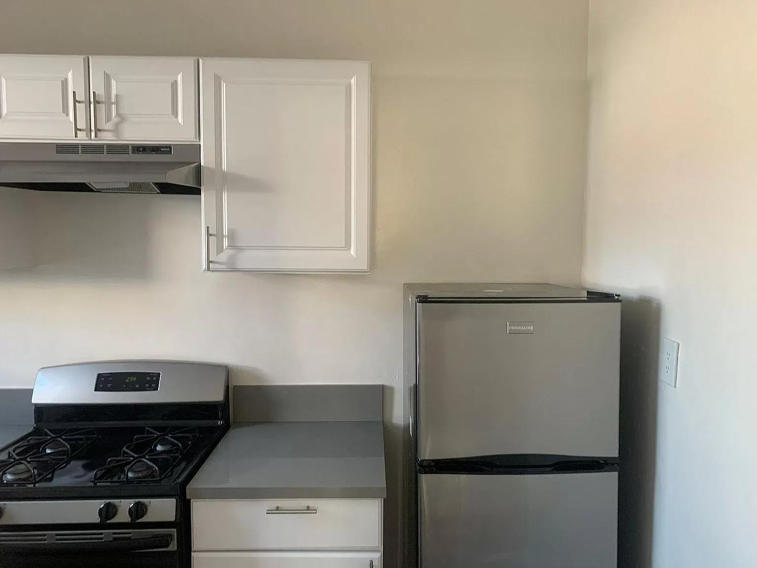 Francis Ave Apartment Kitchen with Stove & Fridge