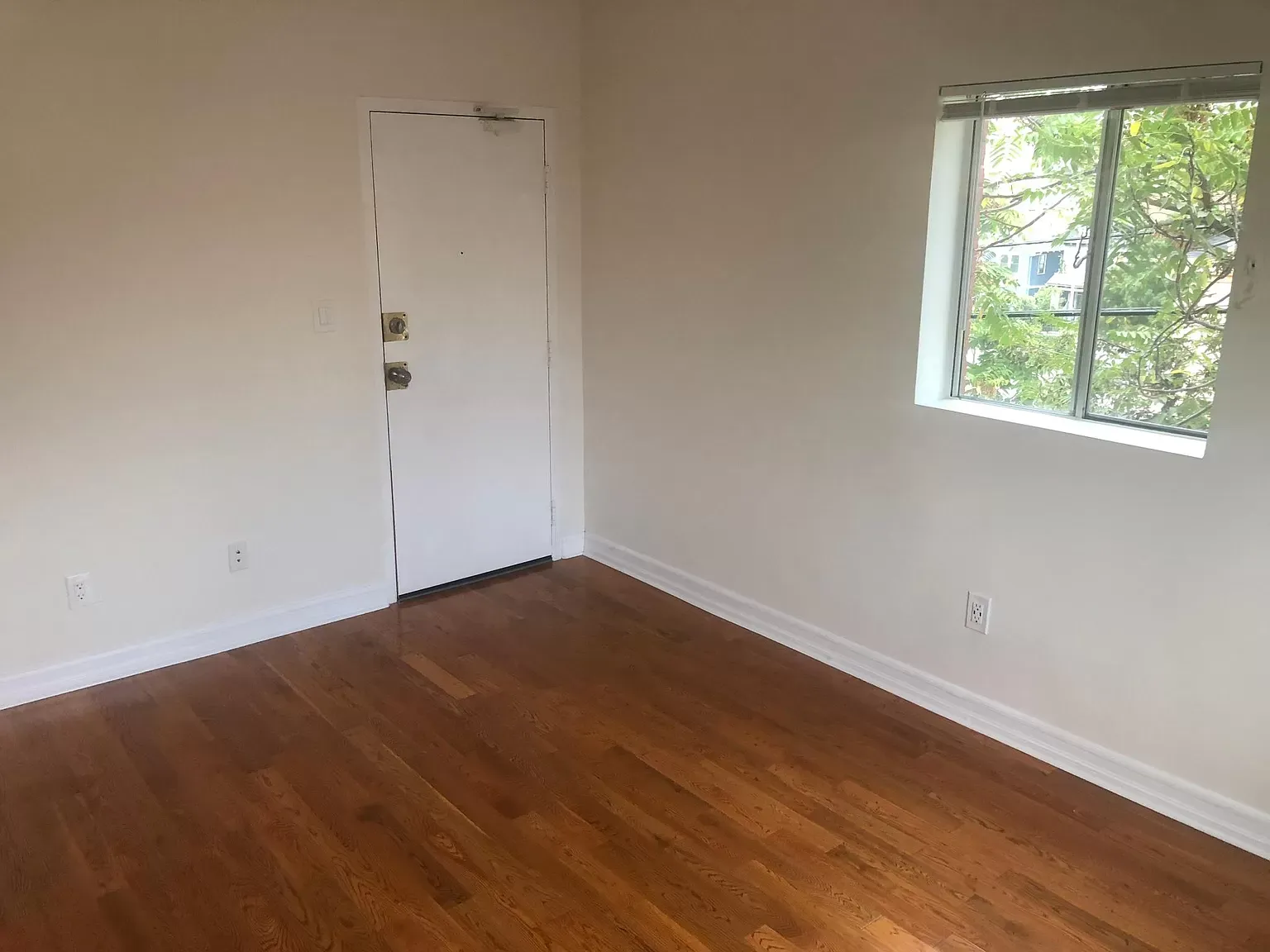 Francis Ave Apartment Bedroom with Hardwood Floors