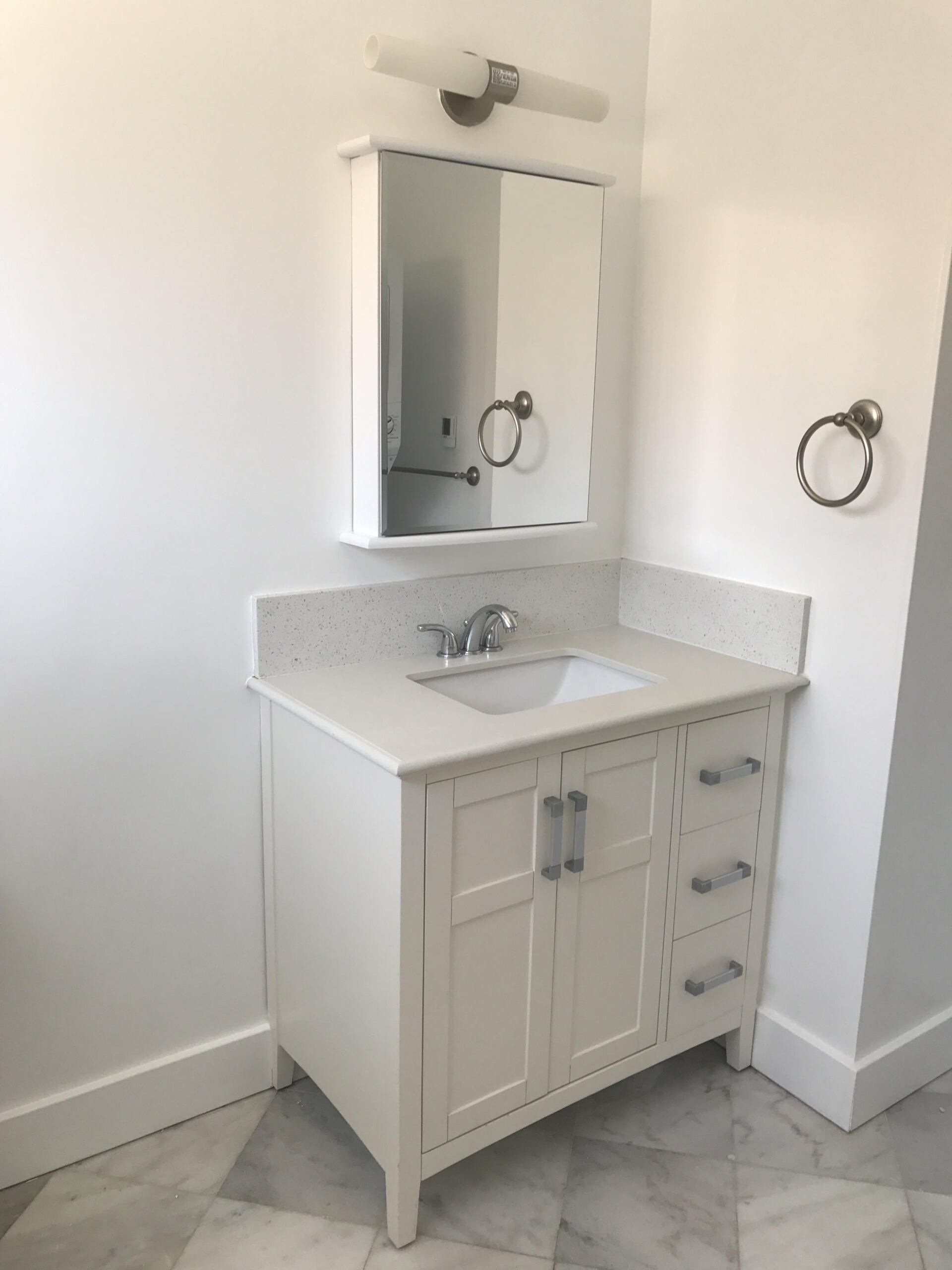 6609-11 Vista Del Mar Bathroom with Sink and Mirror