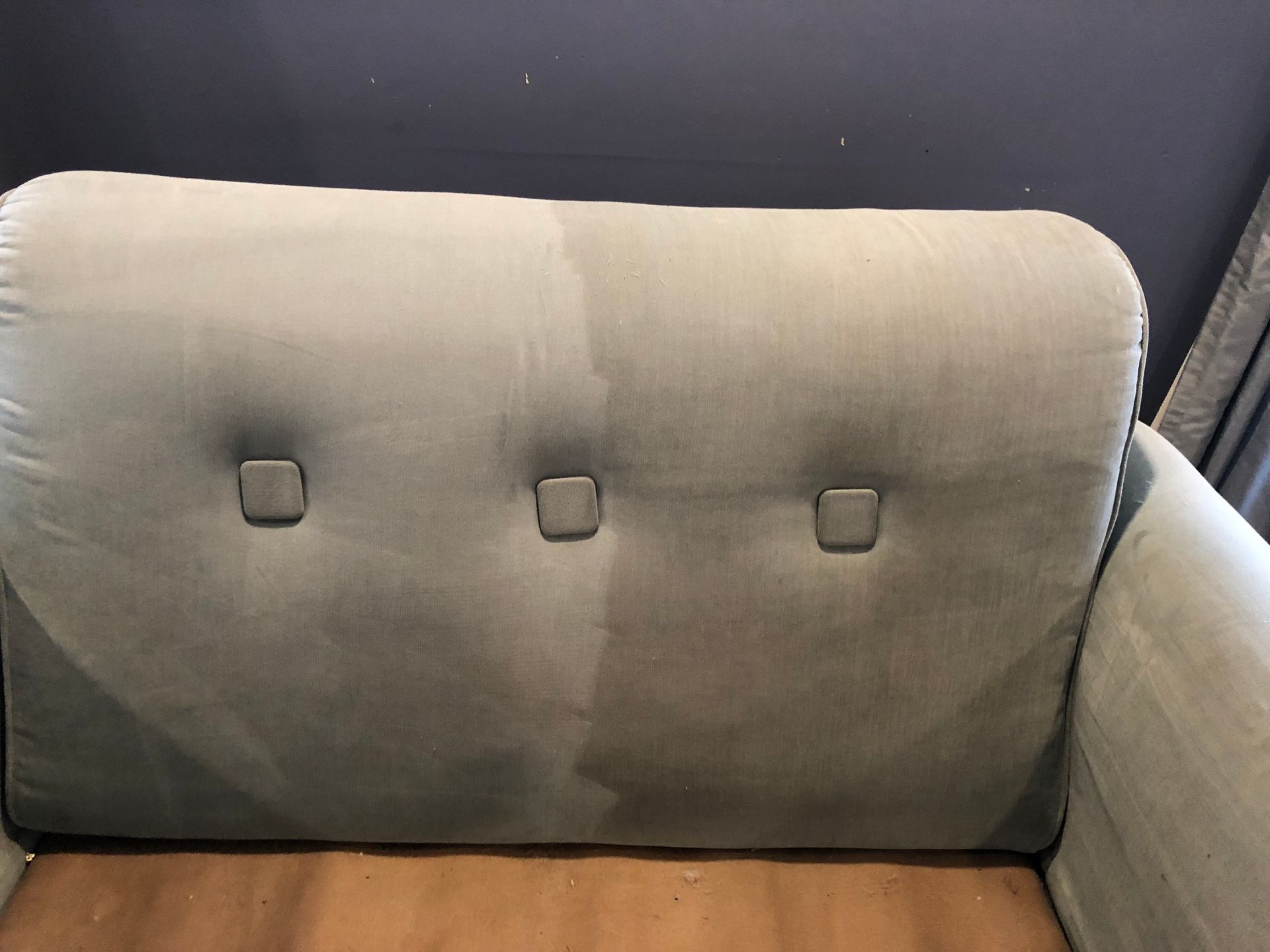 before and after cleauchning an upholstered couch