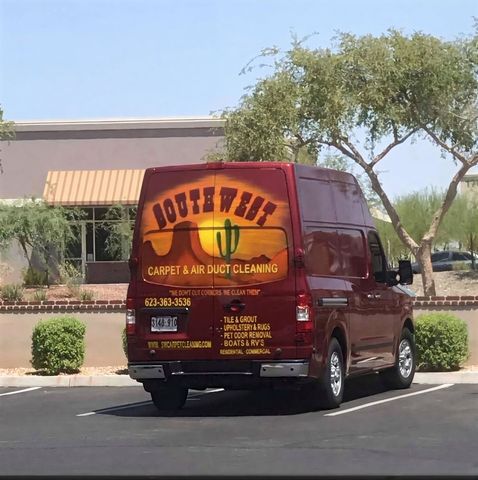 Red van parked, branded with