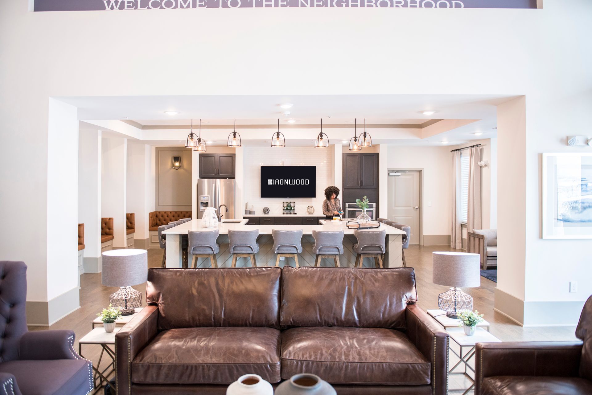 Lobby with leather sofa, bar seating, and