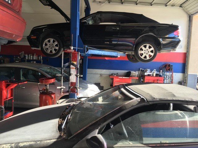 Lifted Car on Auto Repair Shop — Lake Forest, CA — V-Tech Automotive