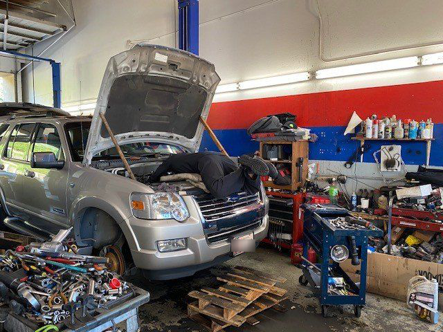 Mechanic Checking the Engine — Lake Forest, CA — V-Tech Automotive