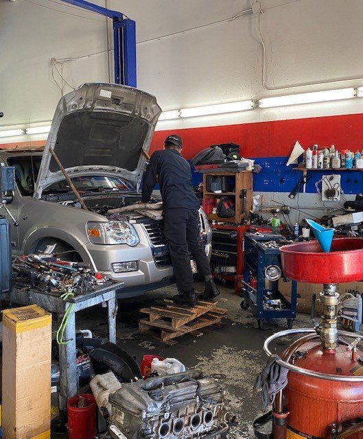 Mechanic Repairing Car Engine — Lake Forest, CA — V-Tech Automotive