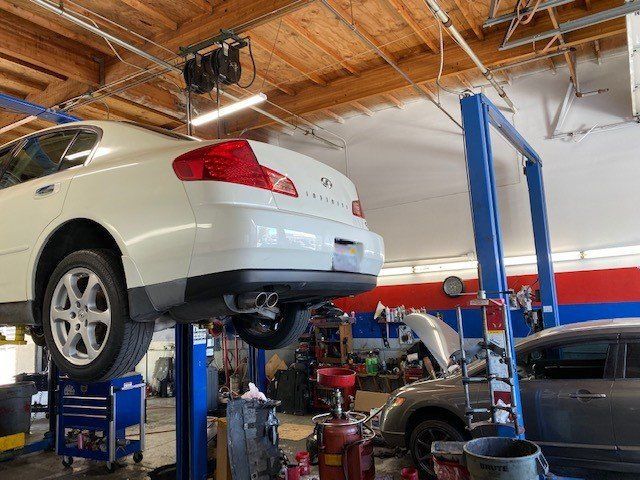 Lifted White Car — Lake Forest, CA — V-Tech Automotive