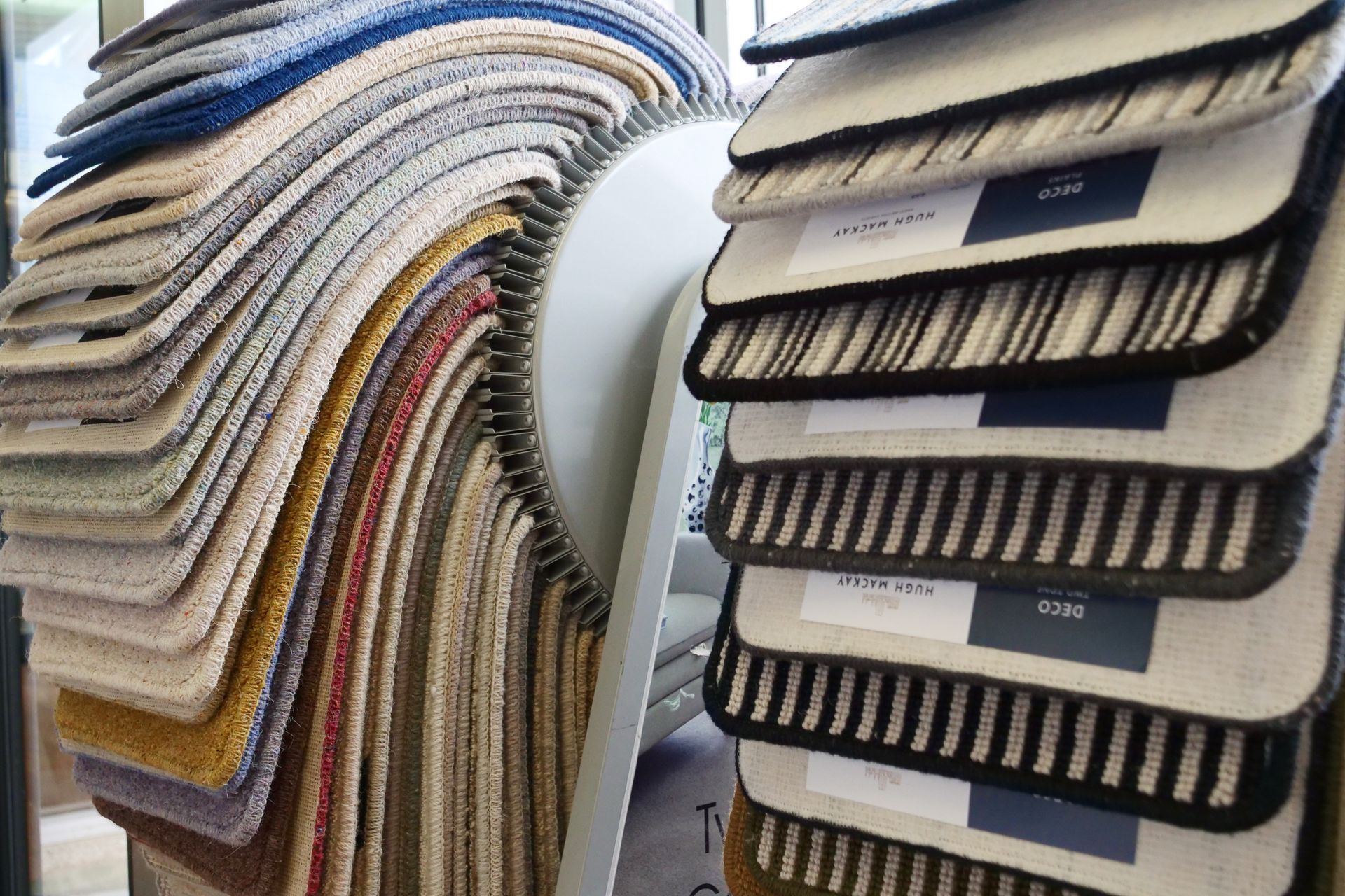 A stack of carpet samples sitting on top of each other