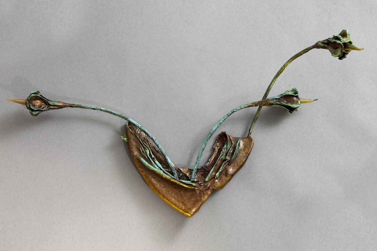 Three Flowers in an Inverted Triangle