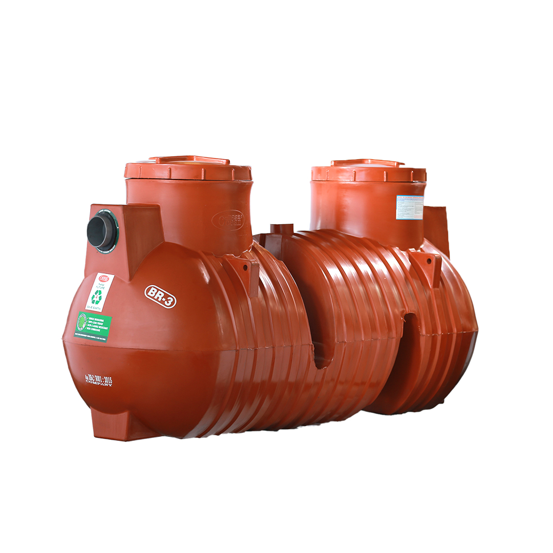 A red septic tank is sitting on a white surface.
