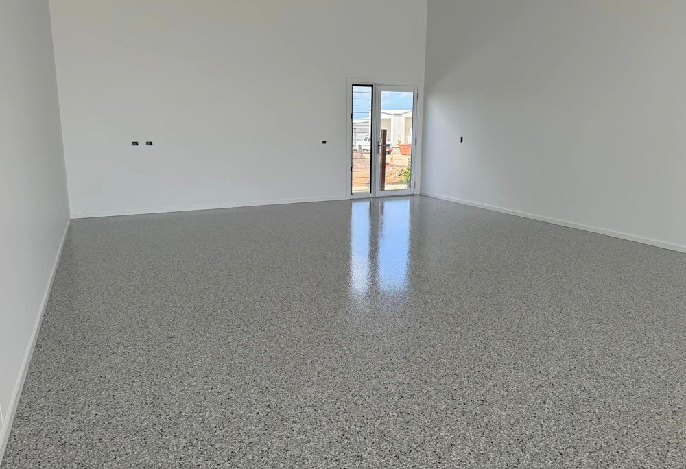 An Empty Room With Epoxy Flooring 