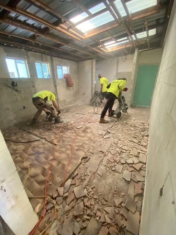 There Are Many Different Types of Tiles on Display in This Room 
— Fraser Coast Waterproofing in Pialba, QLD