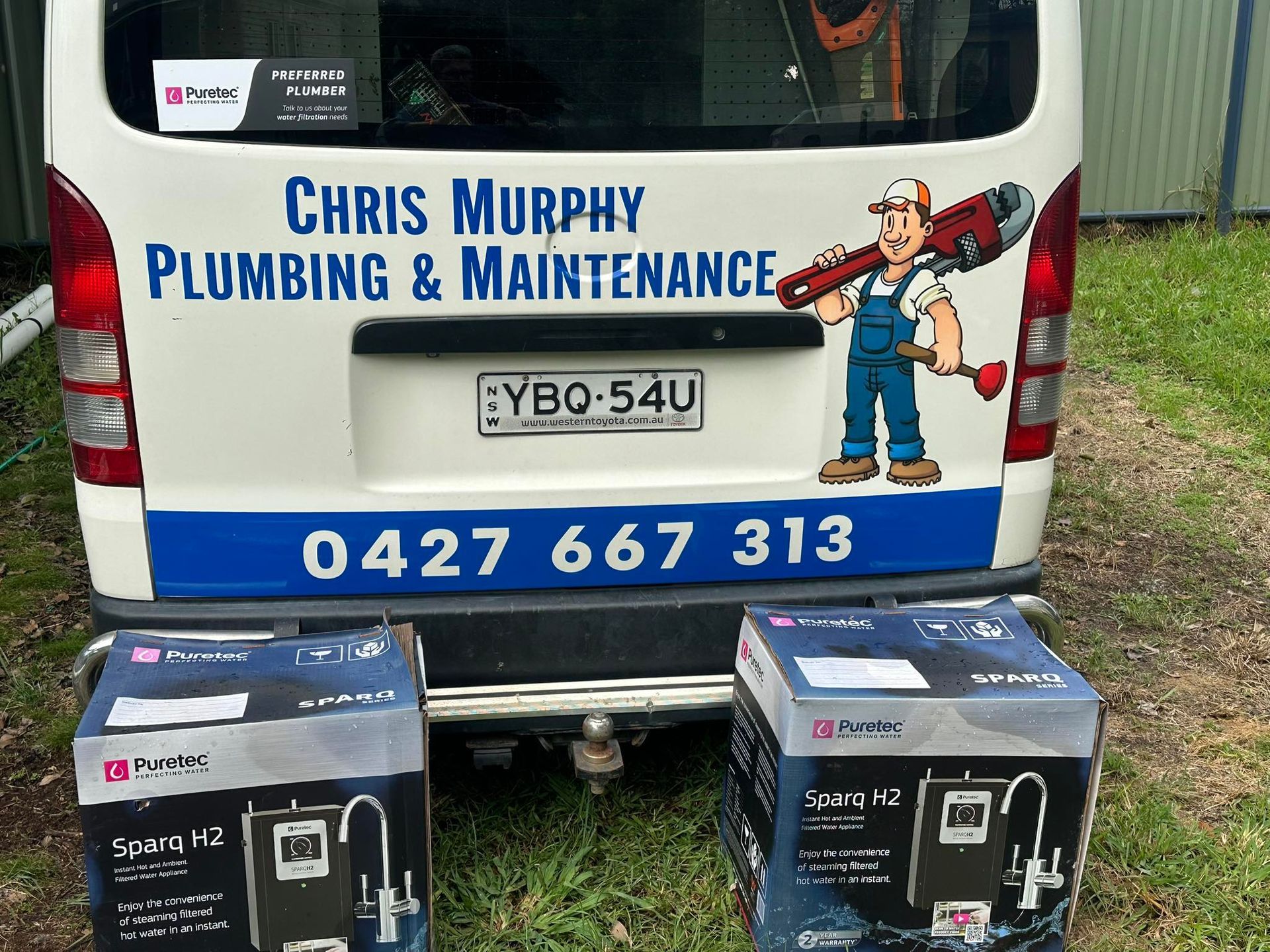 Plumbing Van With Boxes. Blue and White — Chris Murphy Plumbing & Maintenance In Langley Vale, NSW