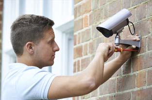 Man Installing a Camera |Superior Alarm Systems|Upper Darby, PA