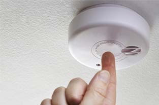 Hand Touching a Security Alarm |Superior Alarm Systems|Upper Darby, PA