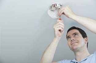 Man Fixing a Security Alarm |Superior Alarm Systems|Upper Darby, PA