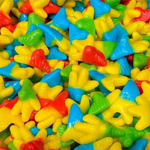 a close up of a pile of colorful gummy worms