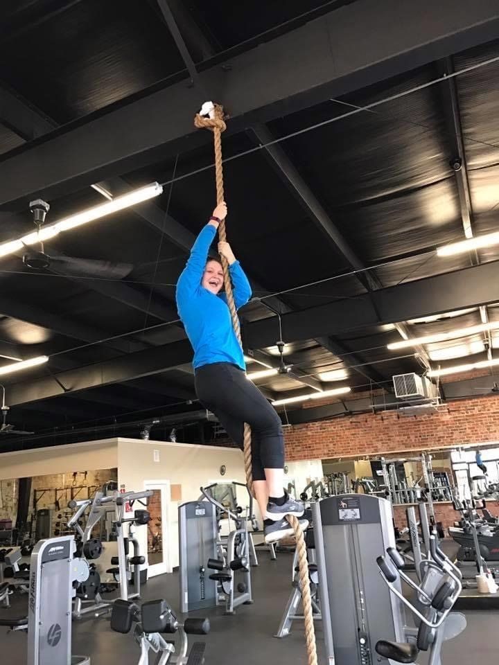 Girl Doing Rope Climbing in Gym — Breckenridge, TX — One More Fitness