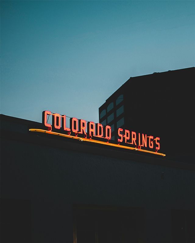 Downtown neon sign featuring the vibrant city of Colorado Spring