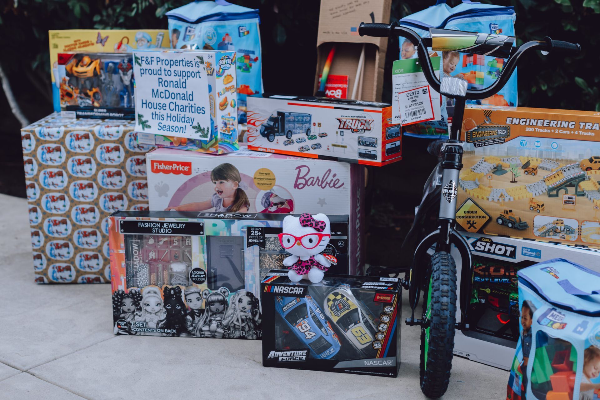 toys stacked at F&F Properties holiday toy drive