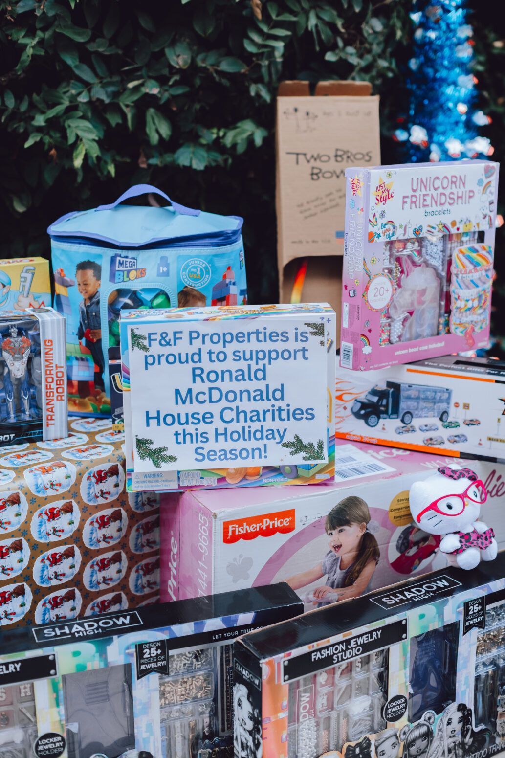 toys stacked F&F Properties holiday toy drive