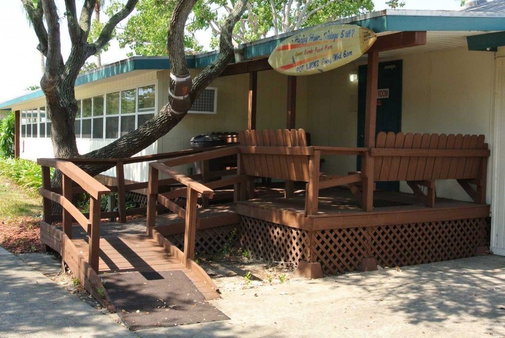 A sign on the side of a building that says