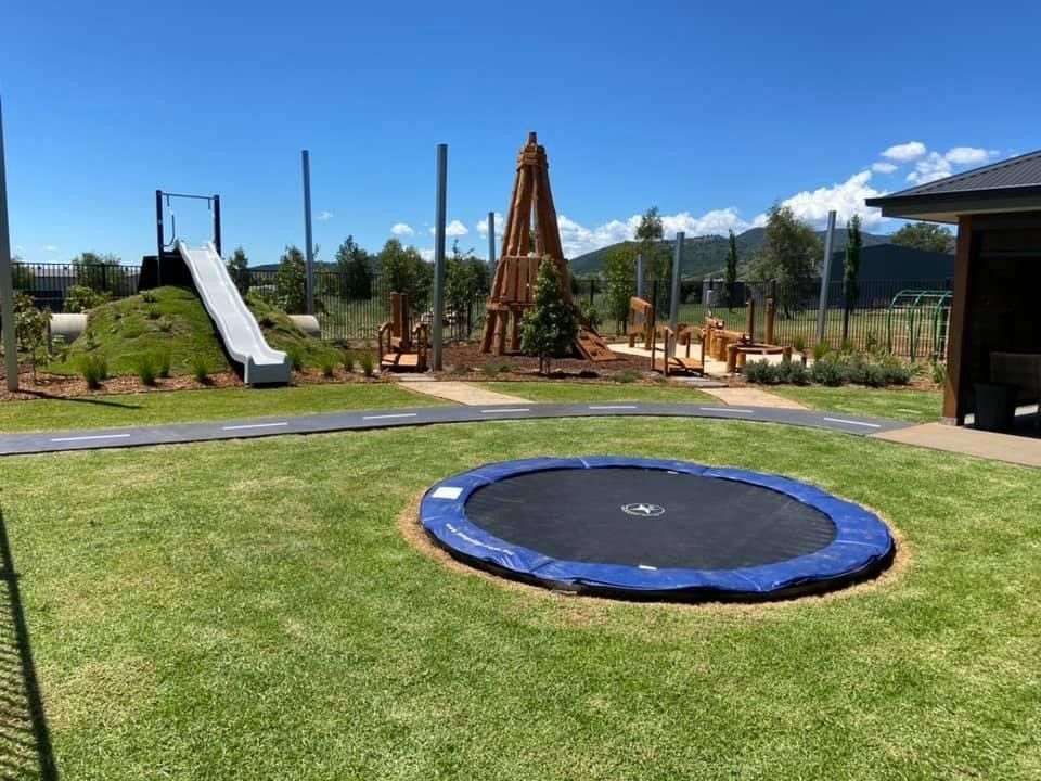 Playground With Slide, Wooden Structure, and Trampoline — ATH Projects in Moore Creek, NSW