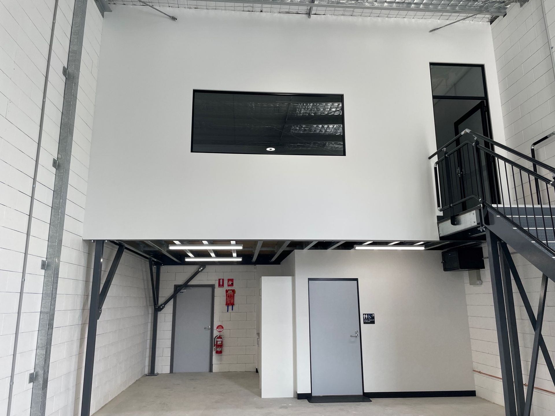 Interior of a Warehouse With a Mezzanine Level — ATH Projects in Kirrawee, NSW