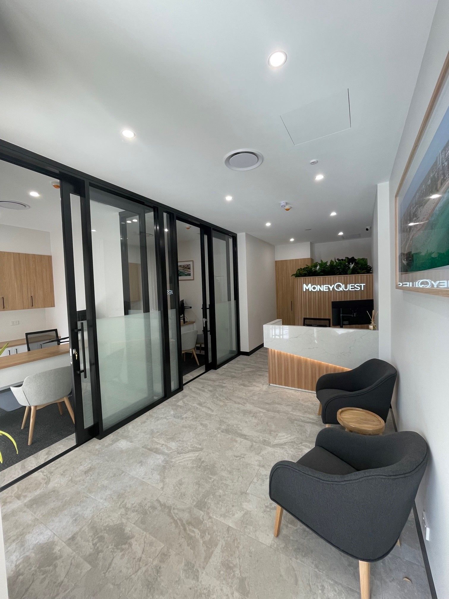 Modern Kitchen With Black and White Cabinets — ATH Projects in Kirrawee, NSW