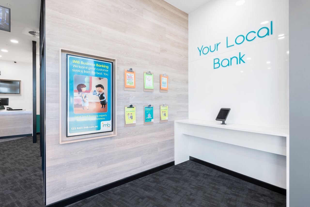 Bank Interior: Ad Display and Informational Displays on Wall — ATH Projects in Kirrawee, NSW