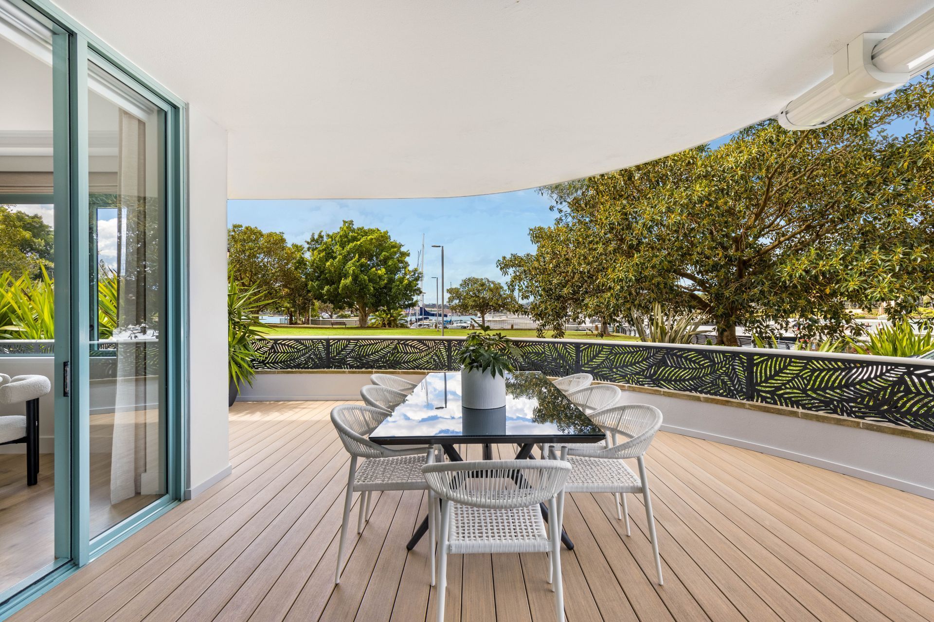 Outdoor Dining Area With a Table and Chairs— ATH Projects in Drummoyne, NSW