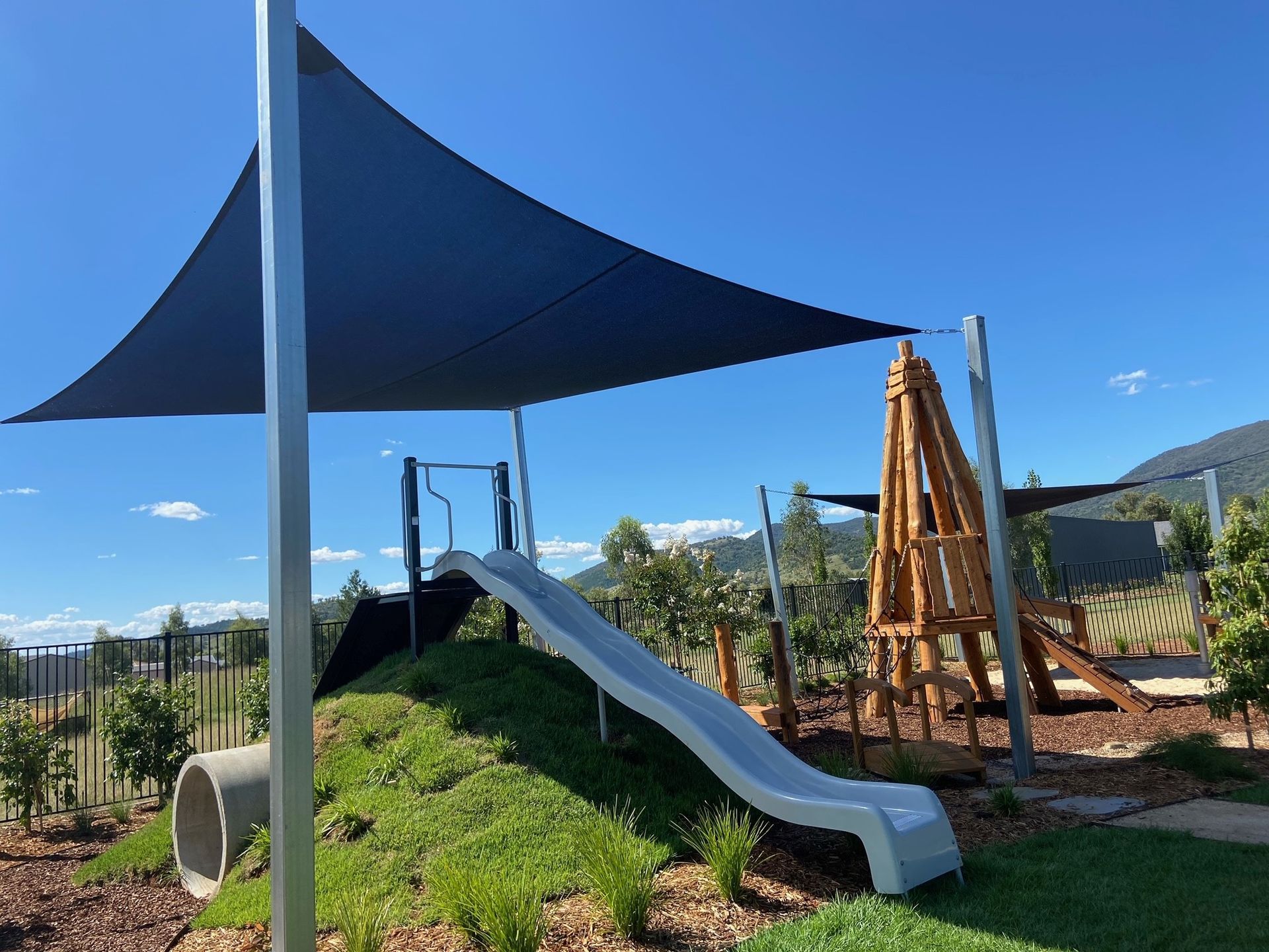 Playground With Slide, Shade Sail, and Wooden Climbing Structure — ATH Projects in Moore Creek, NSW